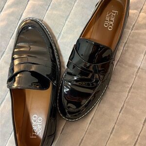 Franco Sarto patented leather loafers in black.